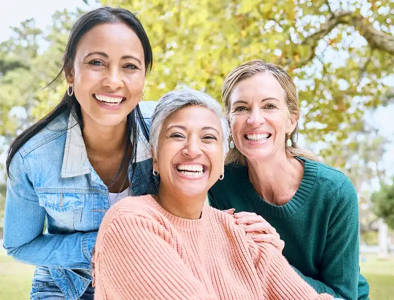 Senior woman with her adult daughters